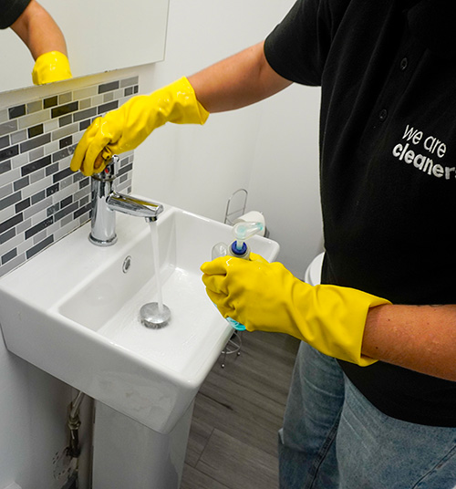 cleaning an office sink